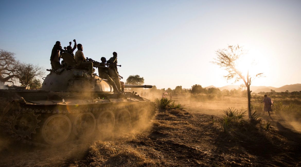 SPLA-North Soldiers drive a tank they captured from the SAF army during an ambush. Over a week, they managed to capture 6 other tanks as well.